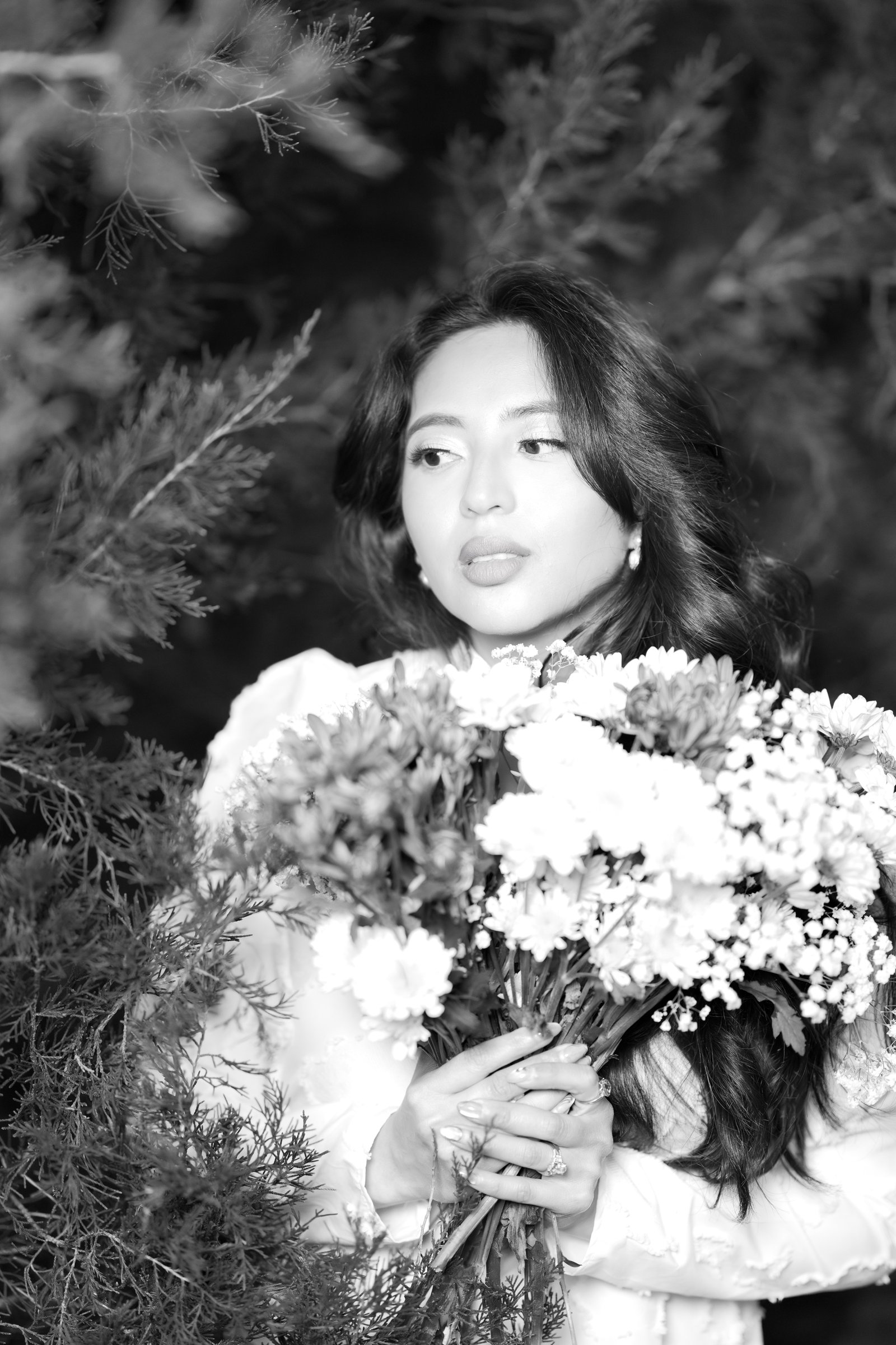Teresa Vitela The Legacy - Black and white portrait. woman in white flowing dress with flash fill light during golden hour birthday session Texas