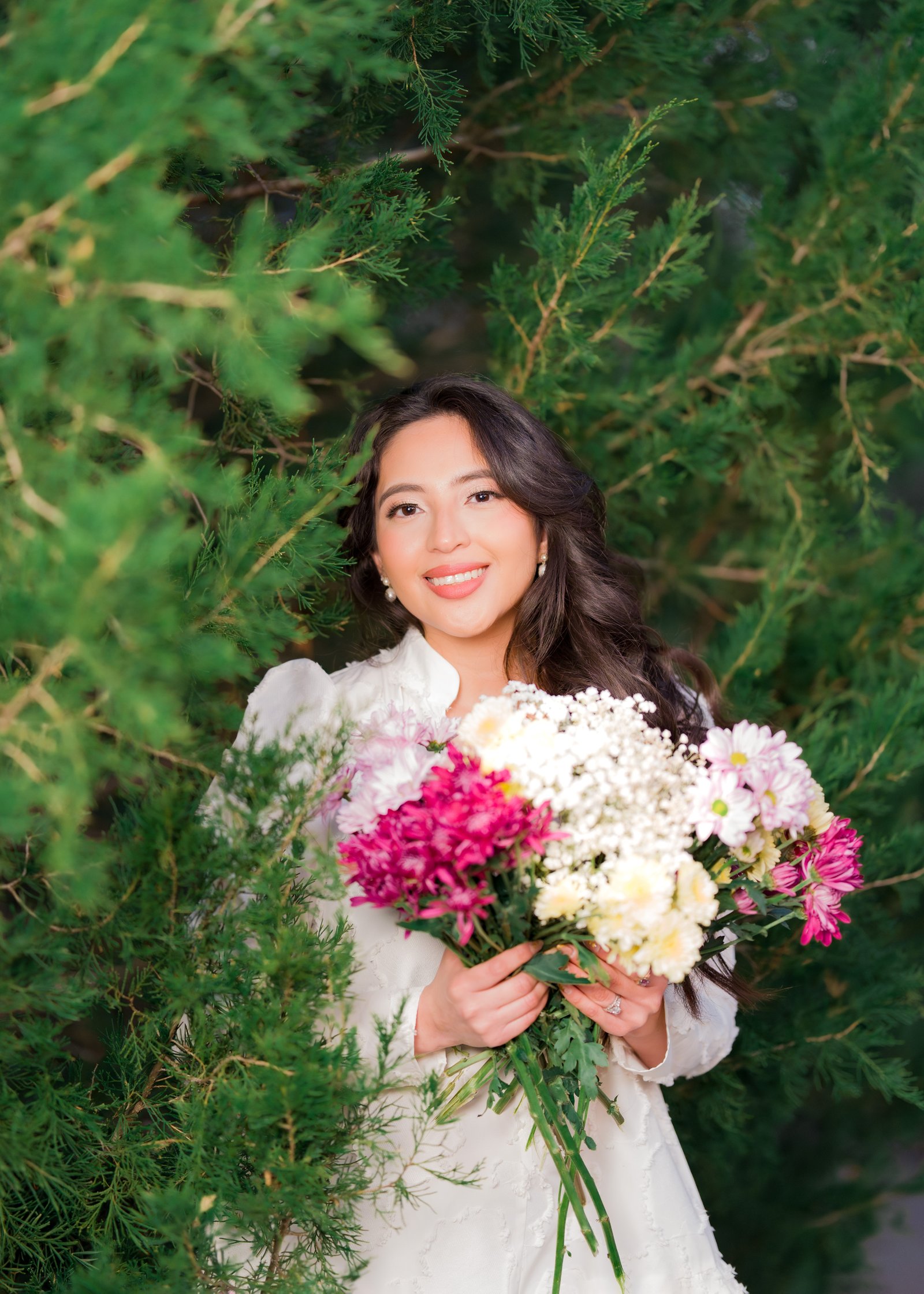 Teresa Vitela The Legacy - dreamy golden backlight birthday portrait woman holding flowers white dress College Station Texas