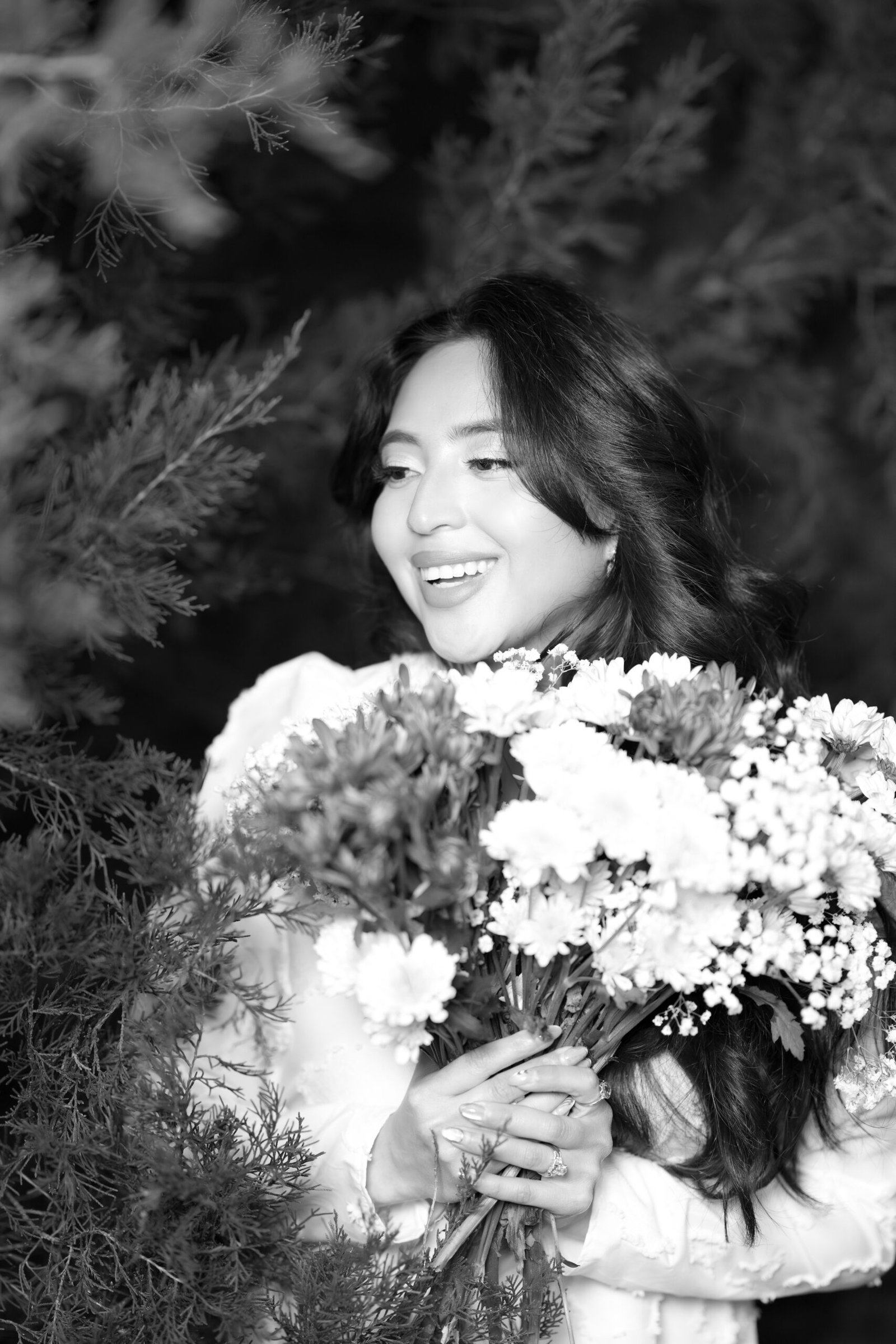 Teresa Vitela The Legacy - Black and white portrait. woman in white flowing dress with flash fill light during golden hour birthday session Texas