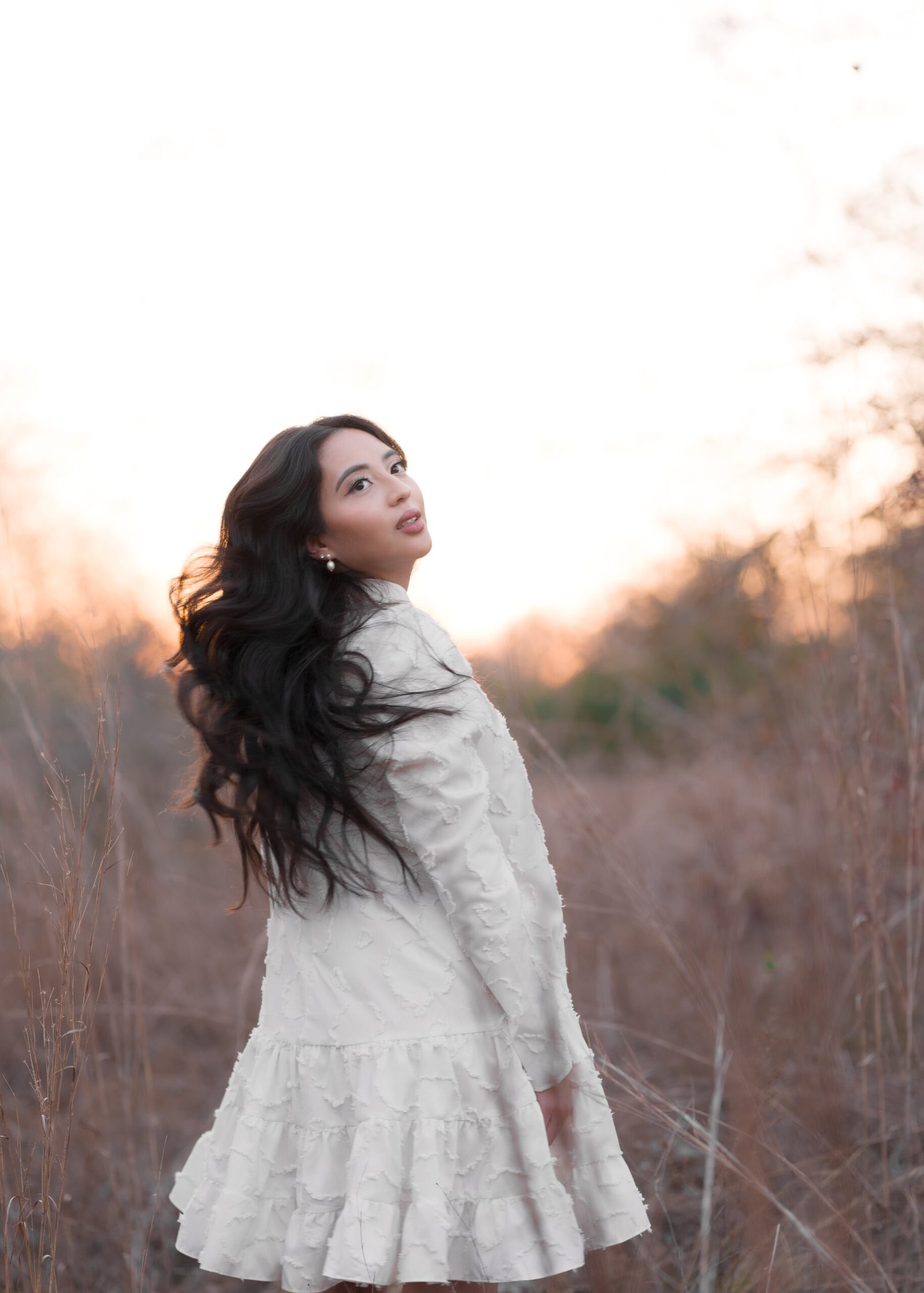 Teresa Vitela The Legacy - fine art outdoor portrait woman walking away into golden hour glow white flowing dress Texas