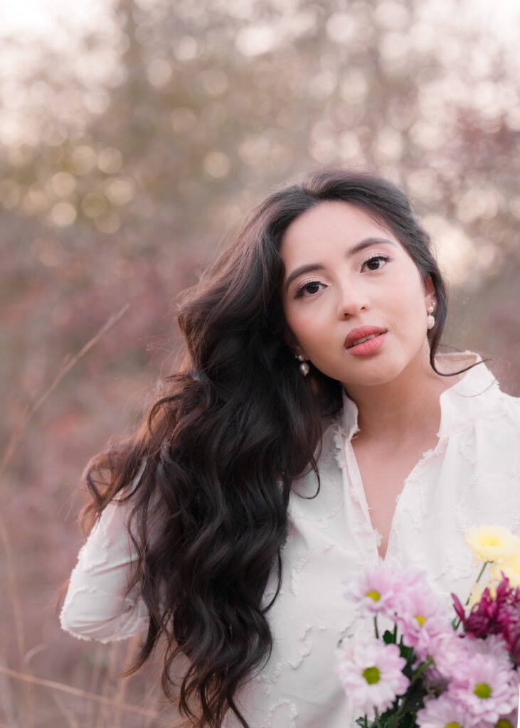 Teresa Vitela The Legacy - beautiful woman in white flowing gown with warm golden backlight birthday celebration portrait Bryan Texas