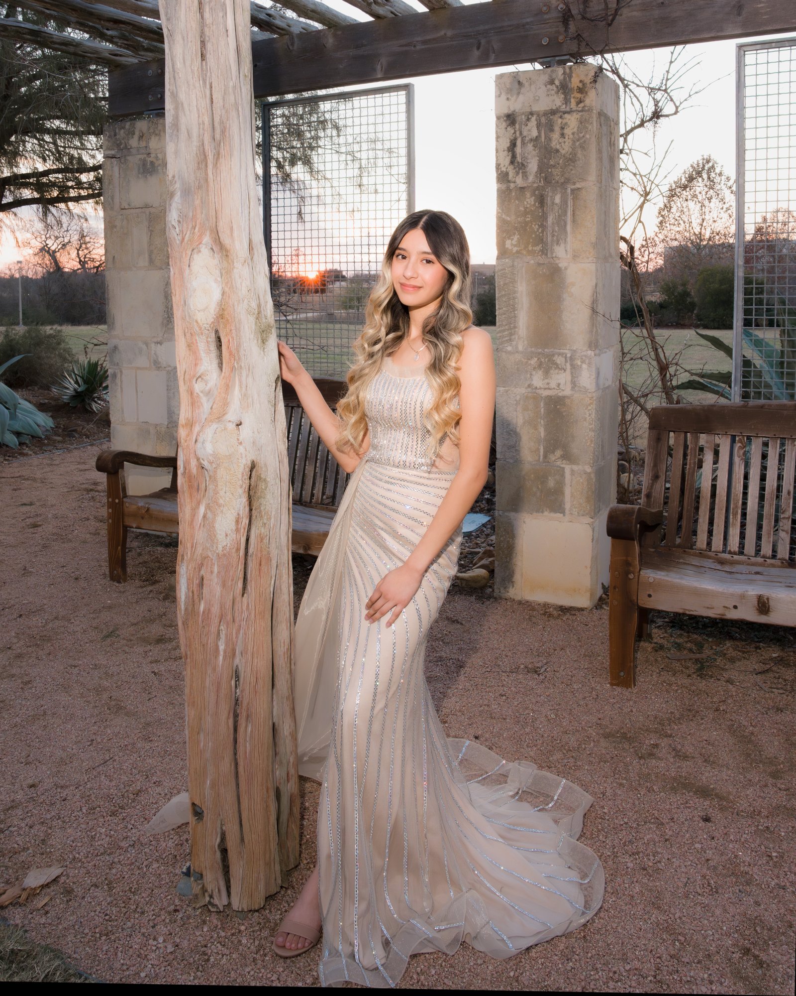Teresa Vitela fine art senior photography - stunning young woman elegant beige dress cantera stone monument Texas A&M Gardens College Station, texas
