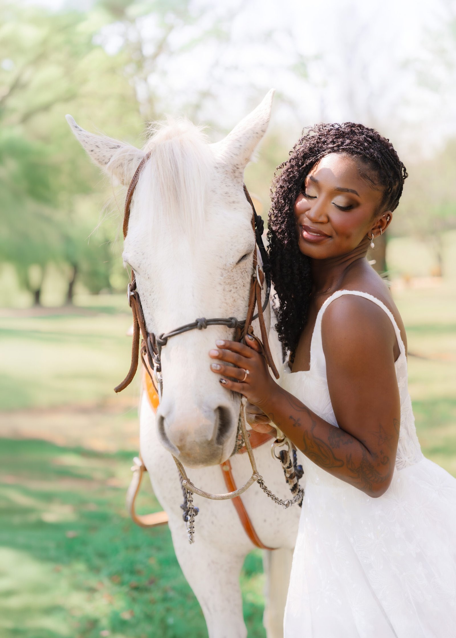 Bride with white horse in soft golden light — fine art bridal portrait by Teresa Vitela Photography Texas