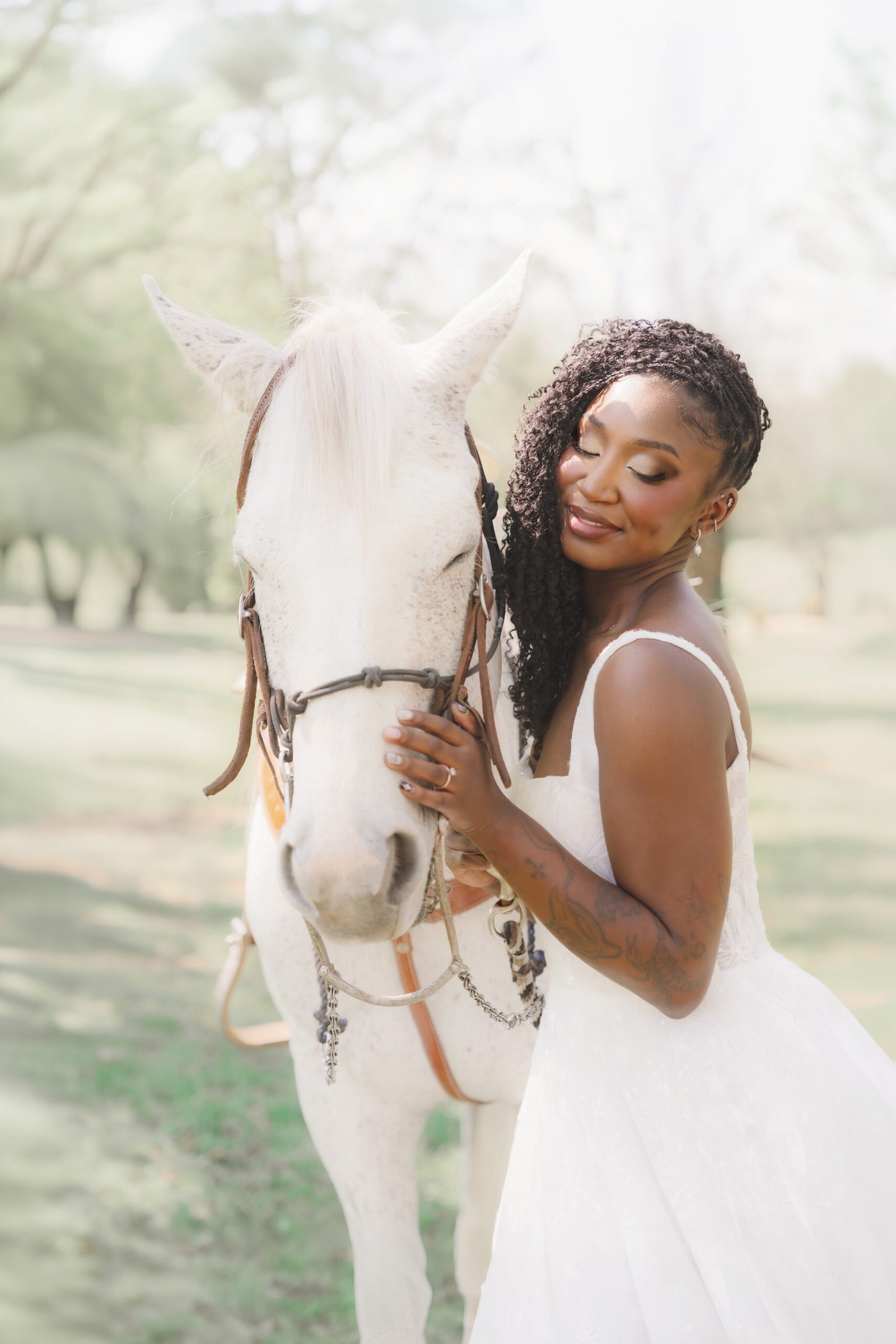 Bride with white horse in soft golden light — fine art bridal portrait by Teresa Vitela Photography Texas| Dallas Texas